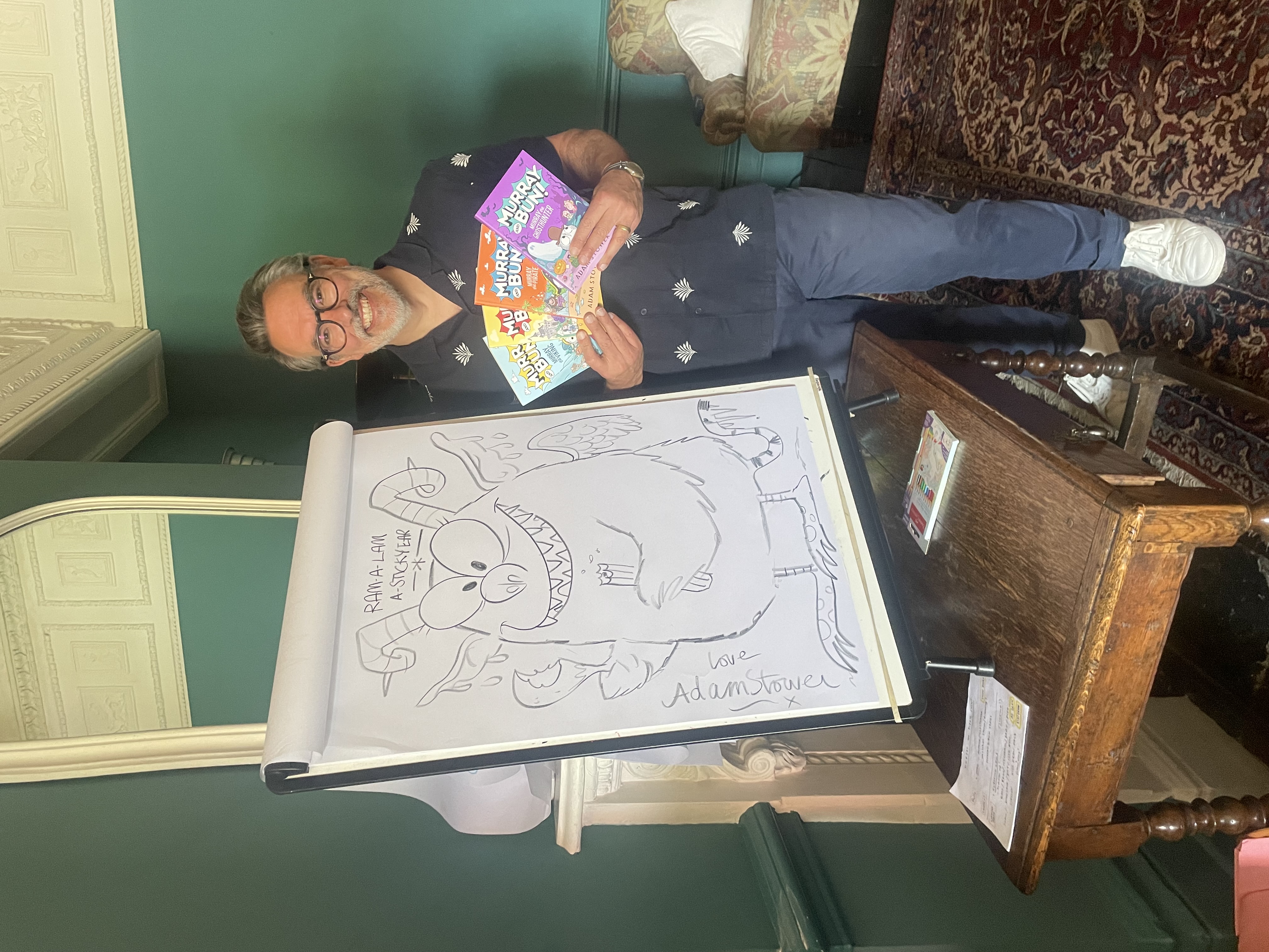 Adam Stower with his drawing