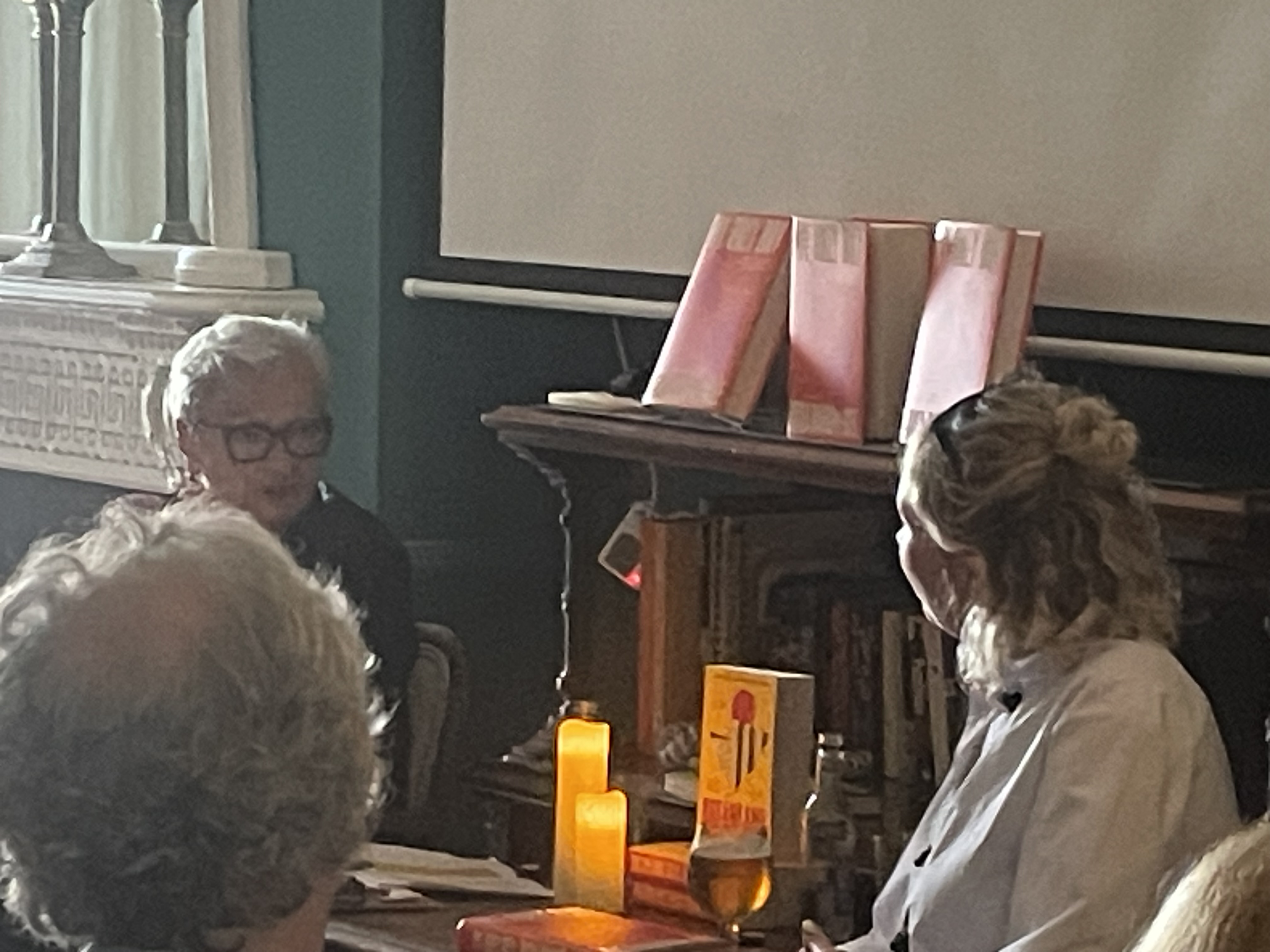 Rosa Rankin-Gee reading by candlelight